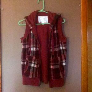 Maurice’s zip up vest.